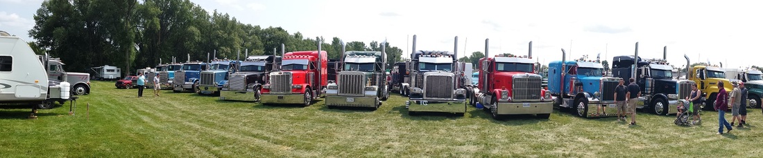 Trucks lined up in a 519 Loud N' Proud Truck Show